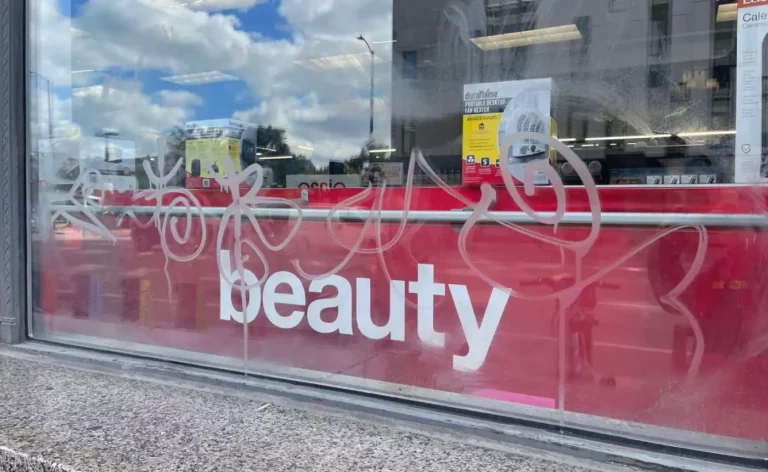 Beauty shop window grafitti removal service